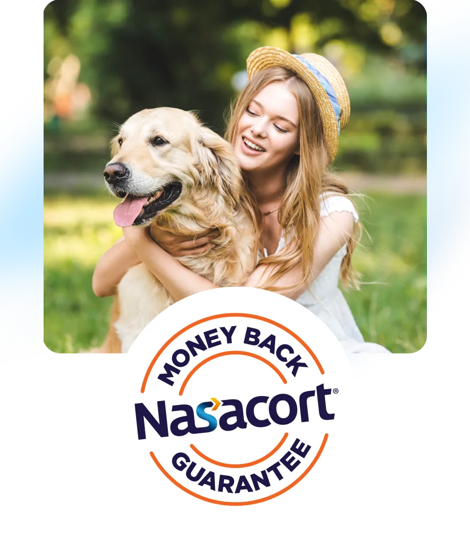 A woman hugs her dog.